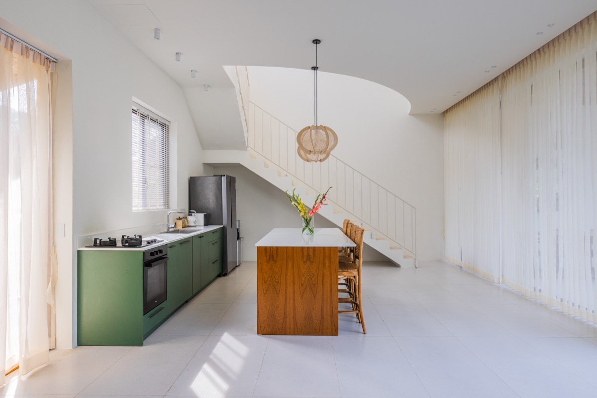 Kitchen with island and staircase