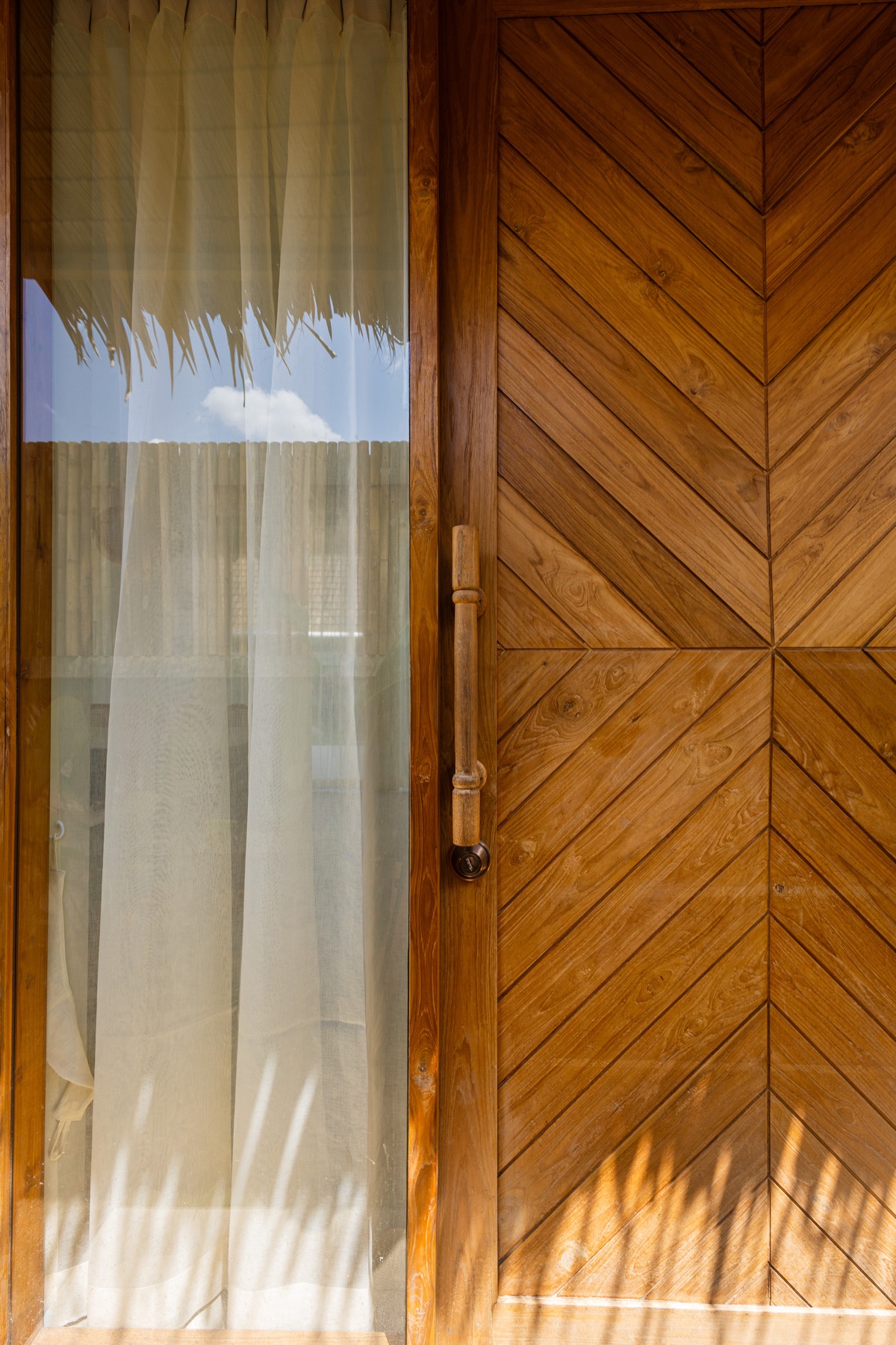 Teak chevron door
